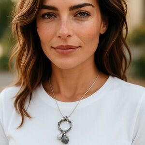 Elegant Silver Plated Necklace with Dual Charms of the Earth and Moon